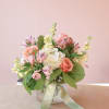 A lush mix of peach, cream and lavender florals in a 6