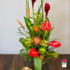 The Beretania Florist Dole Tropical Arrangement is tall and showy. The Dole