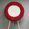 The memorial round frame is a poignant and symbolic tribute, designed to