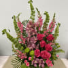 A well organized pink arrangement consisting of mainly Pink Roses &amp; Pink