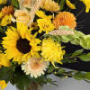 Embrace the cheerful radiance of our Sunny Sunflower Delight. This vibrant arrangement