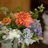 A colorful and fresh arrangement with bright and bold Dahlias. 
