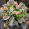 This arrangement is reminiscent of lush green fields during springtime after a