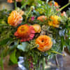 A lush arrangement of cool green and blue textures that drape over