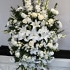 The all white flowers standing spray.