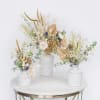 Mini arrangements of assorted earth-toned dried florals in a set of 3