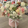 Delicate, serene, and timeless &mdash; this sophisticated flower arrangement is a perfect