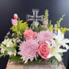 Send your sympathy with a mix of elegant blooms and a beautiful