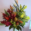 Red Mokara Orchids, orange pin cushion, yellow asiatic lilies, yellow billy balls