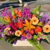 Fun and vibrant colors and flowers designed low with a modern twist