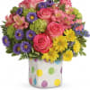 This happy bouquet of darling polka dots and pretty blooms is the