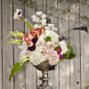 This spectacular arrangment is definitely one for the books. Featuring a variety