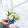 White &amp; Blue bout and corsage 
Please let us know your color