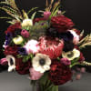 This amazing floral piece of art incorporates the most stunning flowers of
