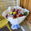 Designer&#039;s Choice Wrap Bouquet in vibrant colors in season florals. Ready to