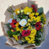 Designer&#039;s Choice Wrap Bouquet in vibrant colors in season florals. Ready to