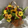 Everyone loves daisies, and we also love sunflowers.  This informal basket