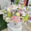 Beautiful composition of light colors in a our signature box. sophistication at