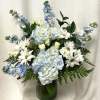 Immerse yourself in a tranquil oasis with our enchanting Sky Blue flower
