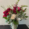 Burgundy, whites, pinks and greens. Peonie and other seasonal flowers