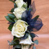  Elevate your special day outfit with our exquisite white spray roses