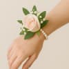 A symbol of effortless elegance, the Touch of Grace Wrist Corsage is