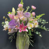 vased mixture of pink stargazers, snsp dragons, stock, ornamental cabbage, ranaculus, 