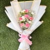 Carnation, MiniCarnation, Babybreath, and wrap paper and pink bow.