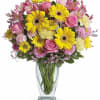 Dazzle someone special with a stylish and bright bouquet! These delightful blossoms