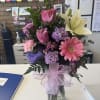 fresh roses , gerbers , carnations with greenery  