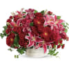 Brimming with hydrangea, orchids, roses and lilies in fabulous fuchsias and radiant