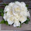 Bridal Bouquet of Ivory Roses, collared with dark greens of ruscus and