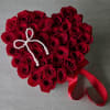 
A breathtaking arrangement of deep red roses, handcrafted into a perfect heart