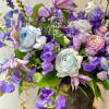 Our enchanting Whimsical Design, brimming with an exquisite selection of seasonal flowers.