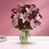 Lovely reds and pinks come together in this lavishly romantic anniversary gift.