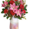 The shimmering, iridescent art glass of this stunning rose quartz inspired, hand-blown