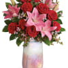 The shimmering, iridescent art glass of this stunning rose quartz inspired, hand-blown