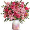 Inspired by rose quartz, the gemstone symbolizing love, this iridescent art glass