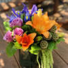 -3 Stems Orange Lilies
-6 Stems Purple Roses
-3 Stems Blue Iris
- Amaranthus
-Greenery
-6x6 Cylinder