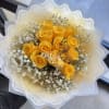 Radiate sunshine and warmth with Golden Grace, a cheerful bouquet of bright