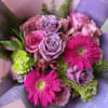 A charming arrangement that blends elegance and freshness. This mix of lavender