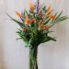 Stately birds of paradise will draw the eye to this vase. 