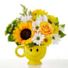 Put a smile on their face with this mug of sunny blooms!
FTD