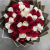 50 Premium White and Red Roses wrapped in special paper