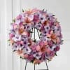 Standing wreath burst with love and sweet comfort to honor the deceased