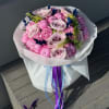 Bouquet with purple peonies and purple roses 