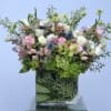 A sweet and gorgeous arrangement with mixed tulips, orchids and hydrangeas in