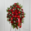 The Treasured Memories Standing Spray is a rich and colorful way to