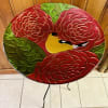 Beautifully designed with a large glass floral bowl, this bird bath will