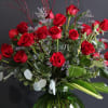 Looking for red roses, but something more than a dozen? This arrangement